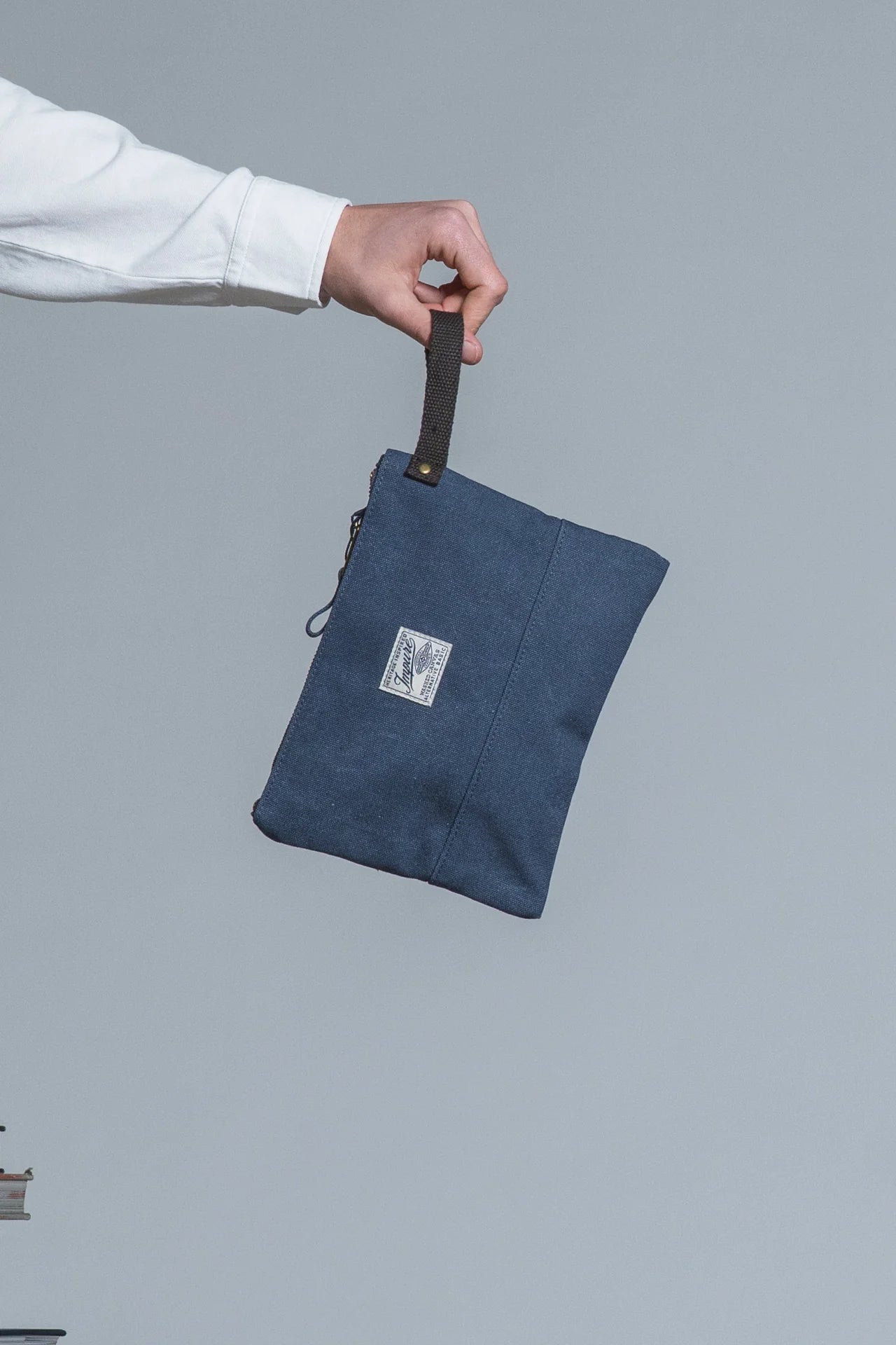 SOHO CLUTCH BAG IN CANVAS NAVY